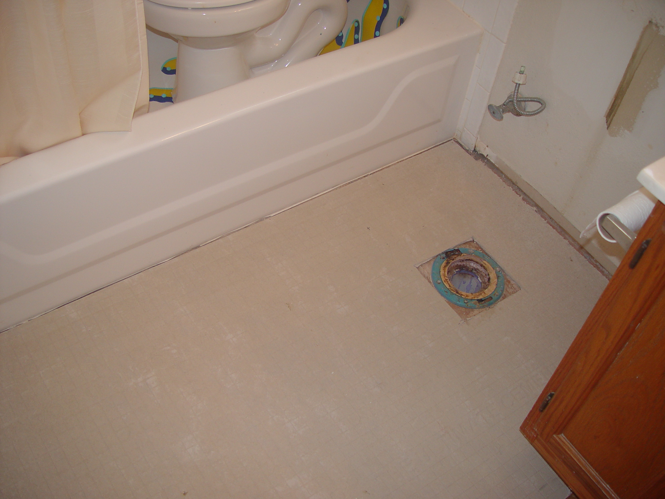 Tiling the Upstairs Bathroom