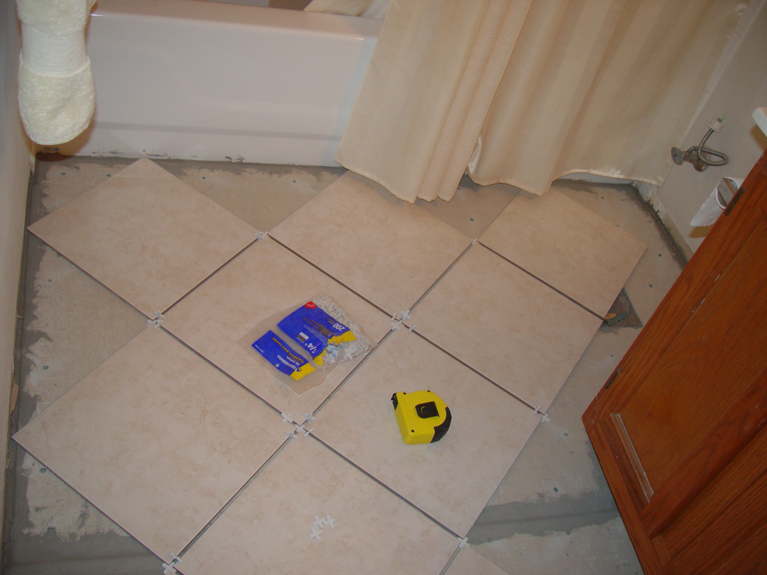 Tiling the Upstairs Bathroom