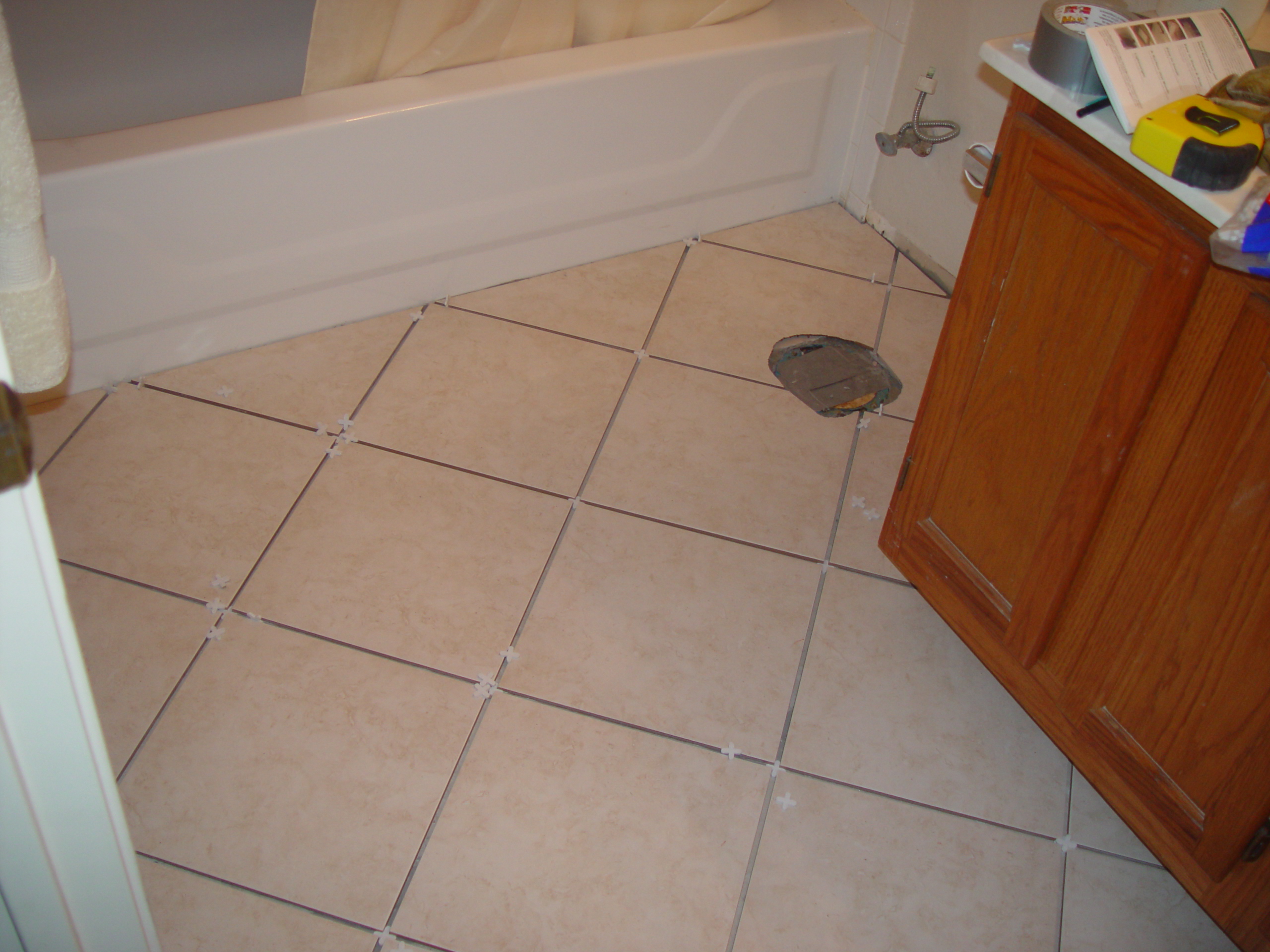 Tiling the Upstairs Bathroom