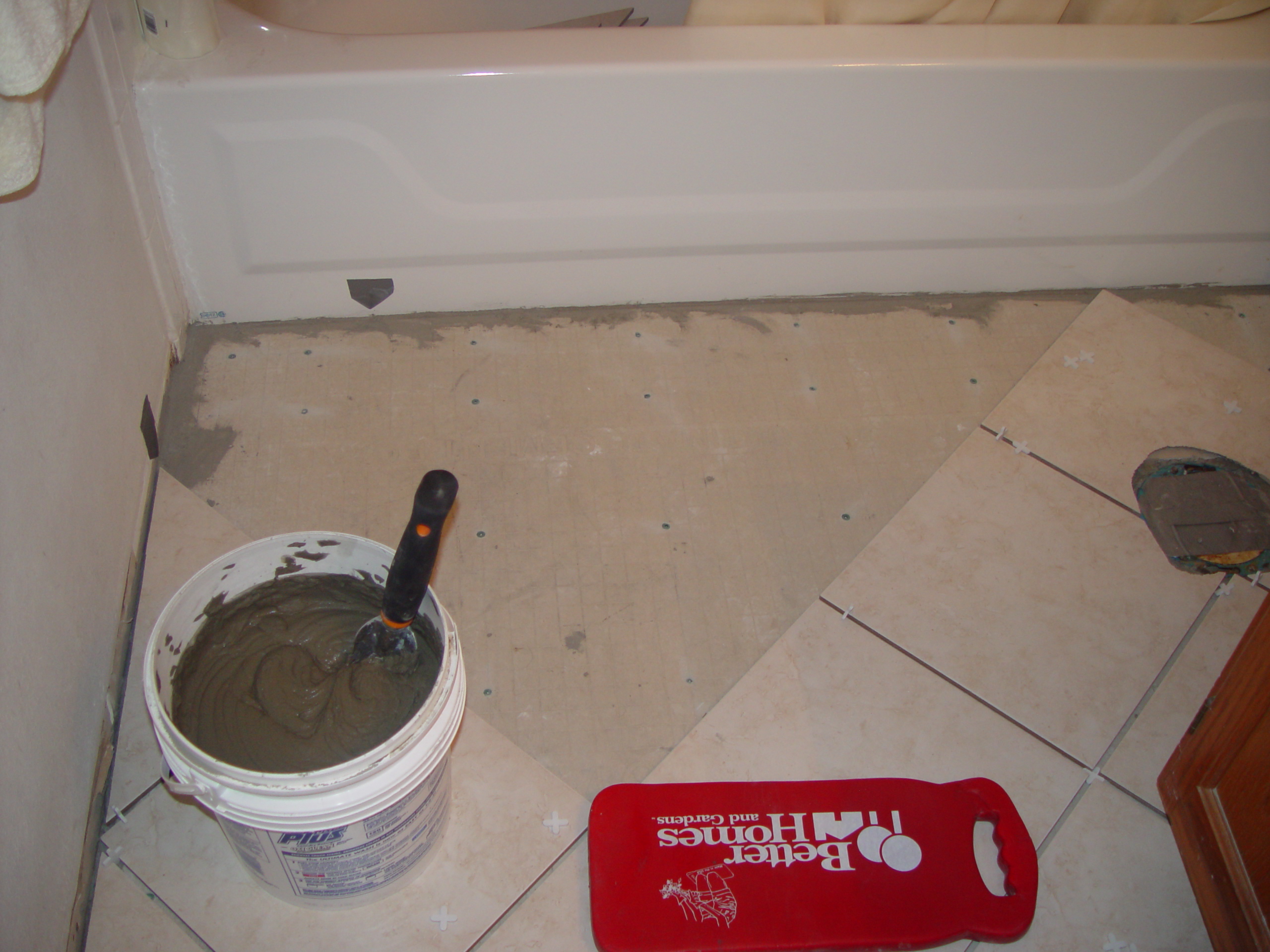 Tiling the Upstairs Bathroom