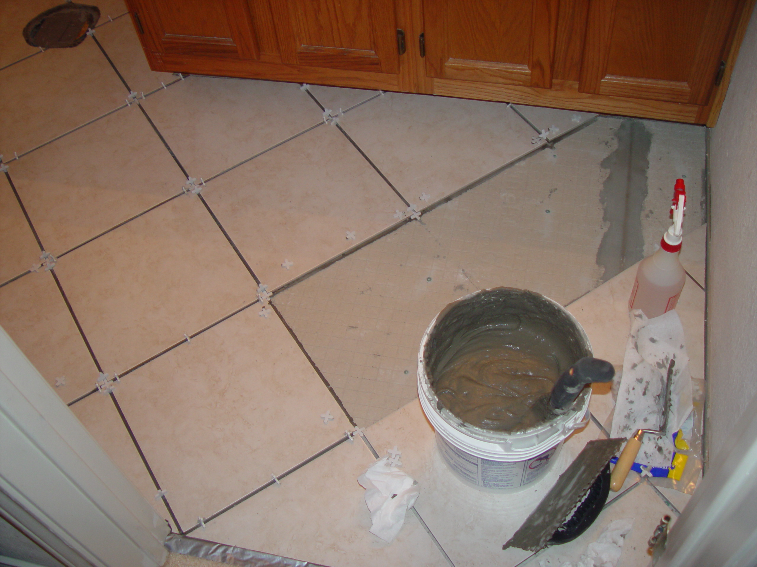 Tiling the Upstairs Bathroom