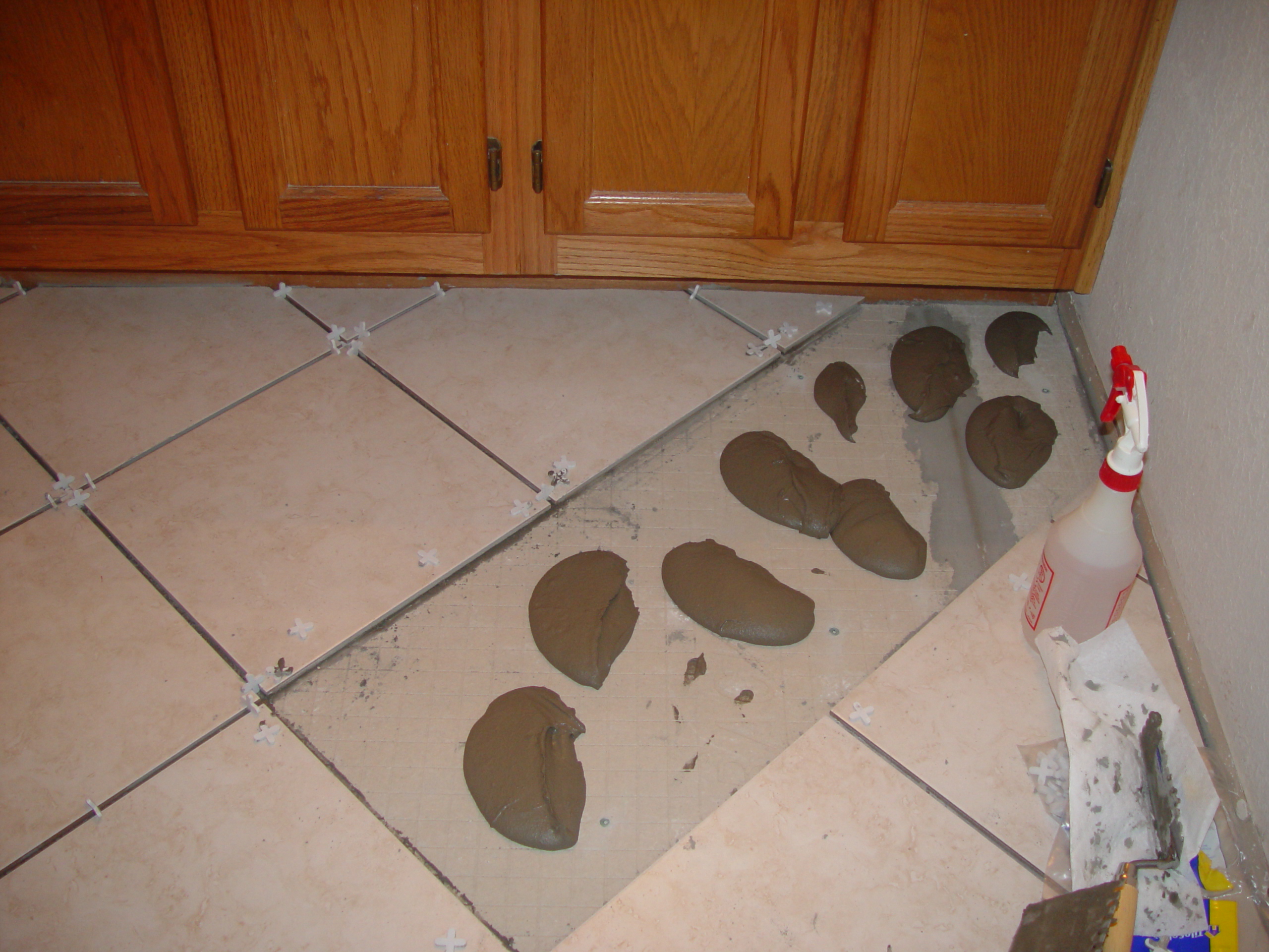 Tiling the Upstairs Bathroom