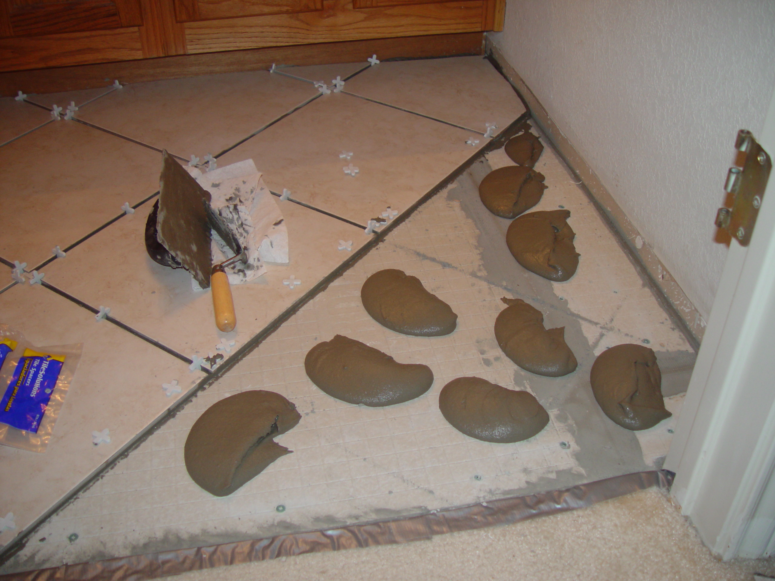 Tiling the Upstairs Bathroom