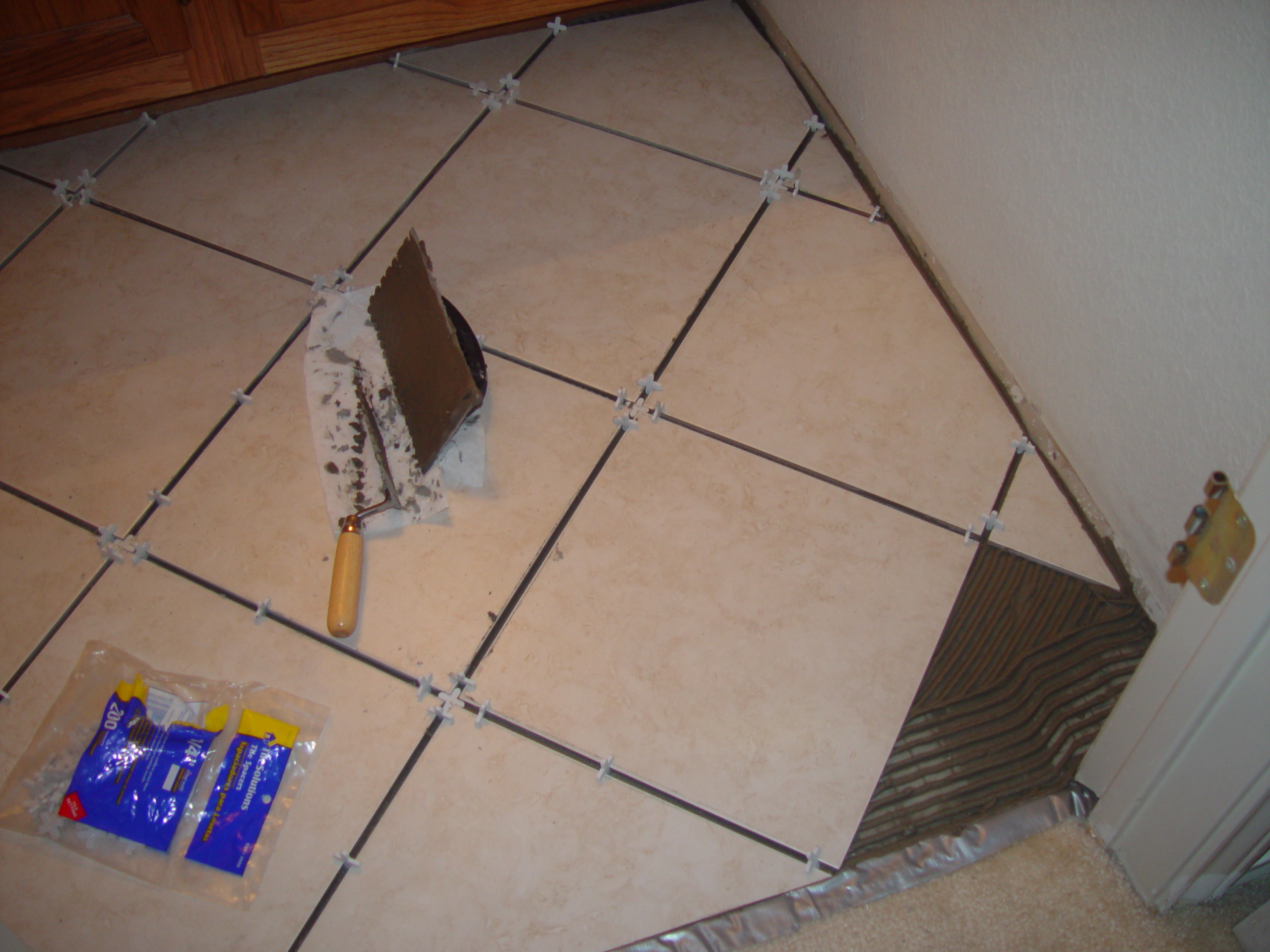 Tiling the Upstairs Bathroom