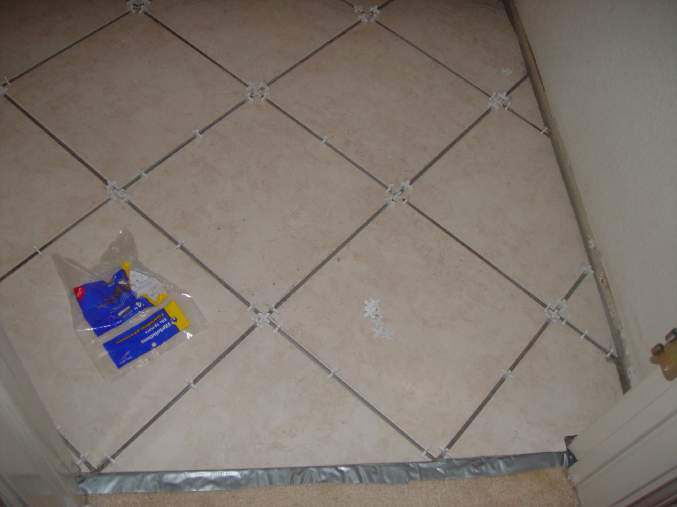 Tiling the Upstairs Bathroom