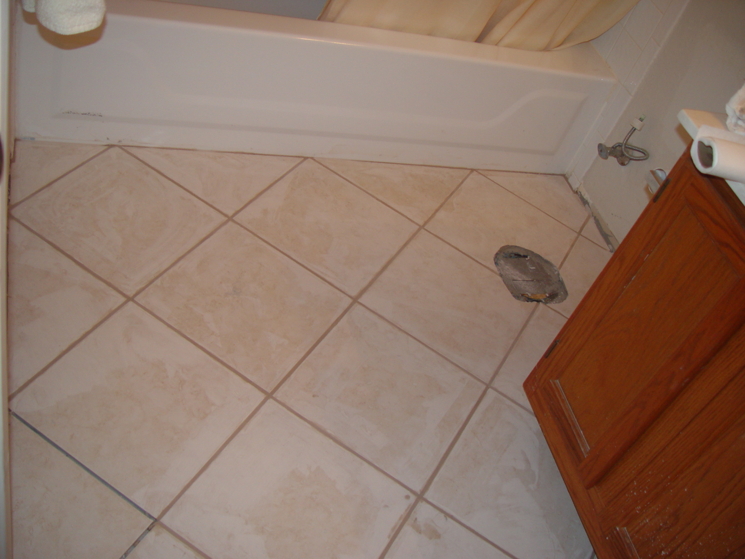 Tiling the Upstairs Bathroom