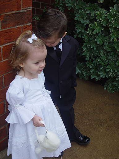 Photos of Zack and Ava in their Wedding Clothes