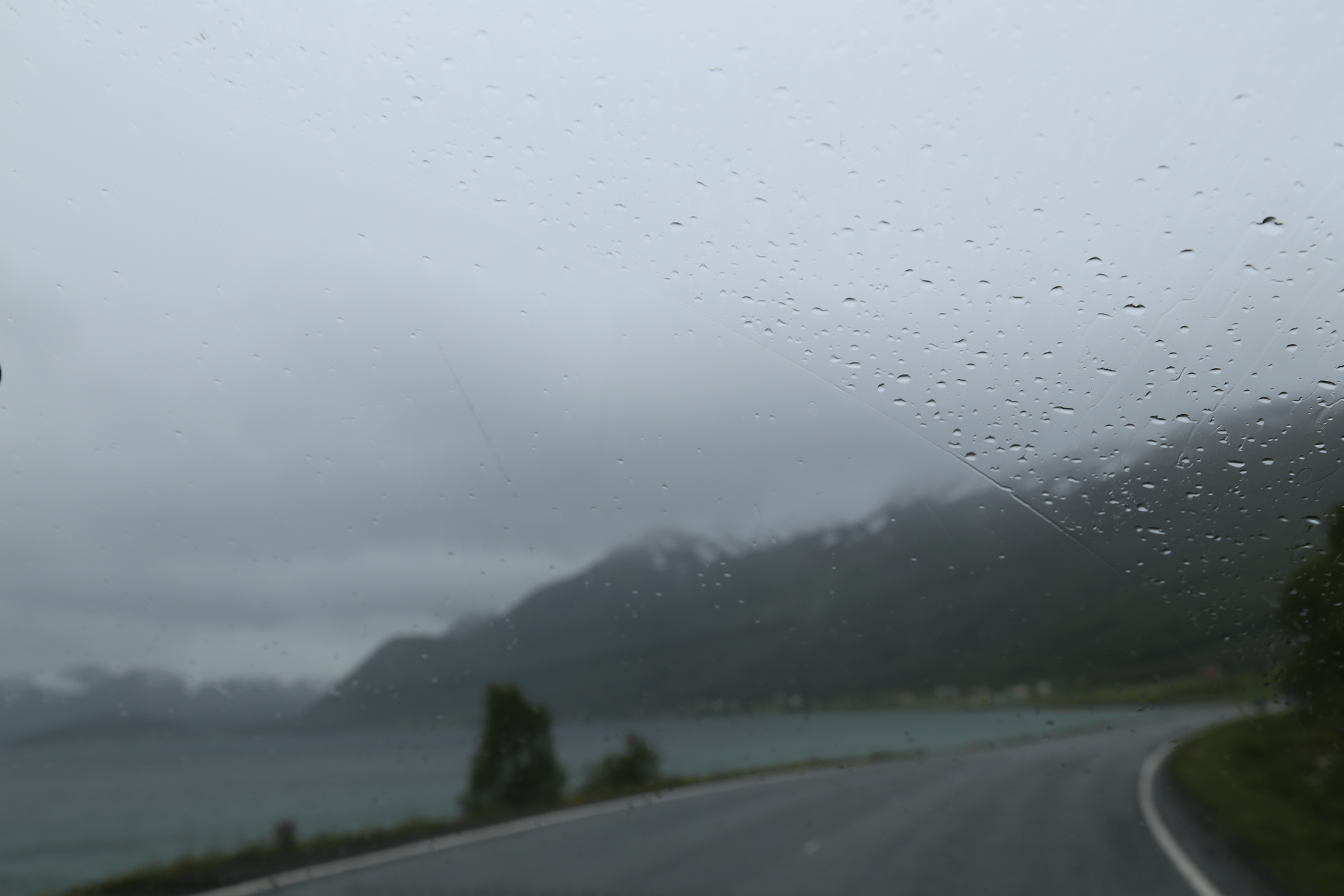 2014 Europe Trip Day 18 - Norway (Lofoten Islands: Sordal Tunnel (4 miles),  Sloverfjord Tunnel (2 miles), Chocolate Chip Rolls, Svolvaer, Lofoten Stockfish (Hanging Cod), Fishing Village Named Å, Snails, Fiskeburger (Fish Burger), Wild Reindeer) 