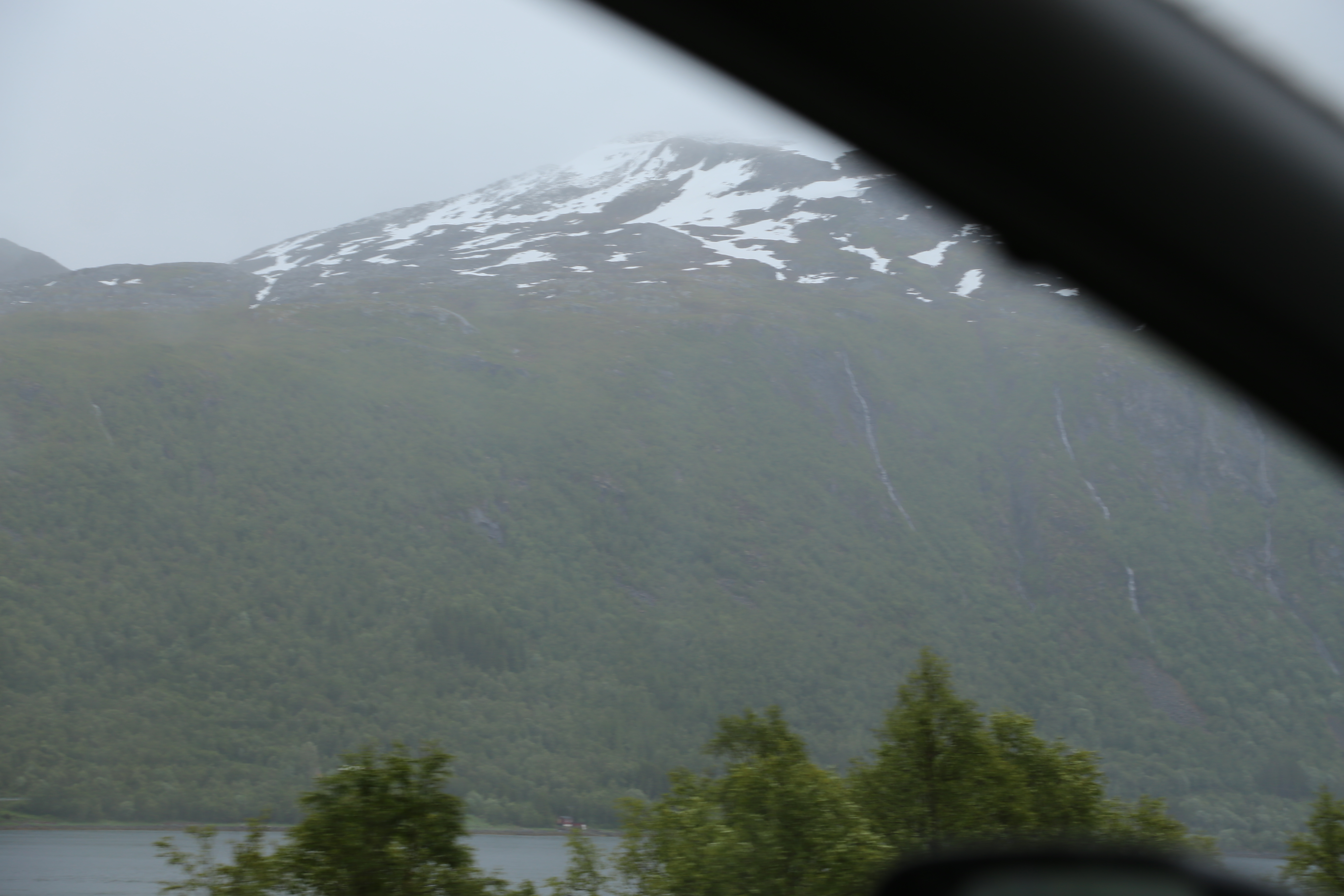 2014 Europe Trip Day 18 - Norway (Lofoten Islands: Sordal Tunnel (4 miles),  Sloverfjord Tunnel (2 miles), Chocolate Chip Rolls, Svolvaer, Lofoten Stockfish (Hanging Cod), Fishing Village Named Å, Snails, Fiskeburger (Fish Burger), Wild Reindeer) 