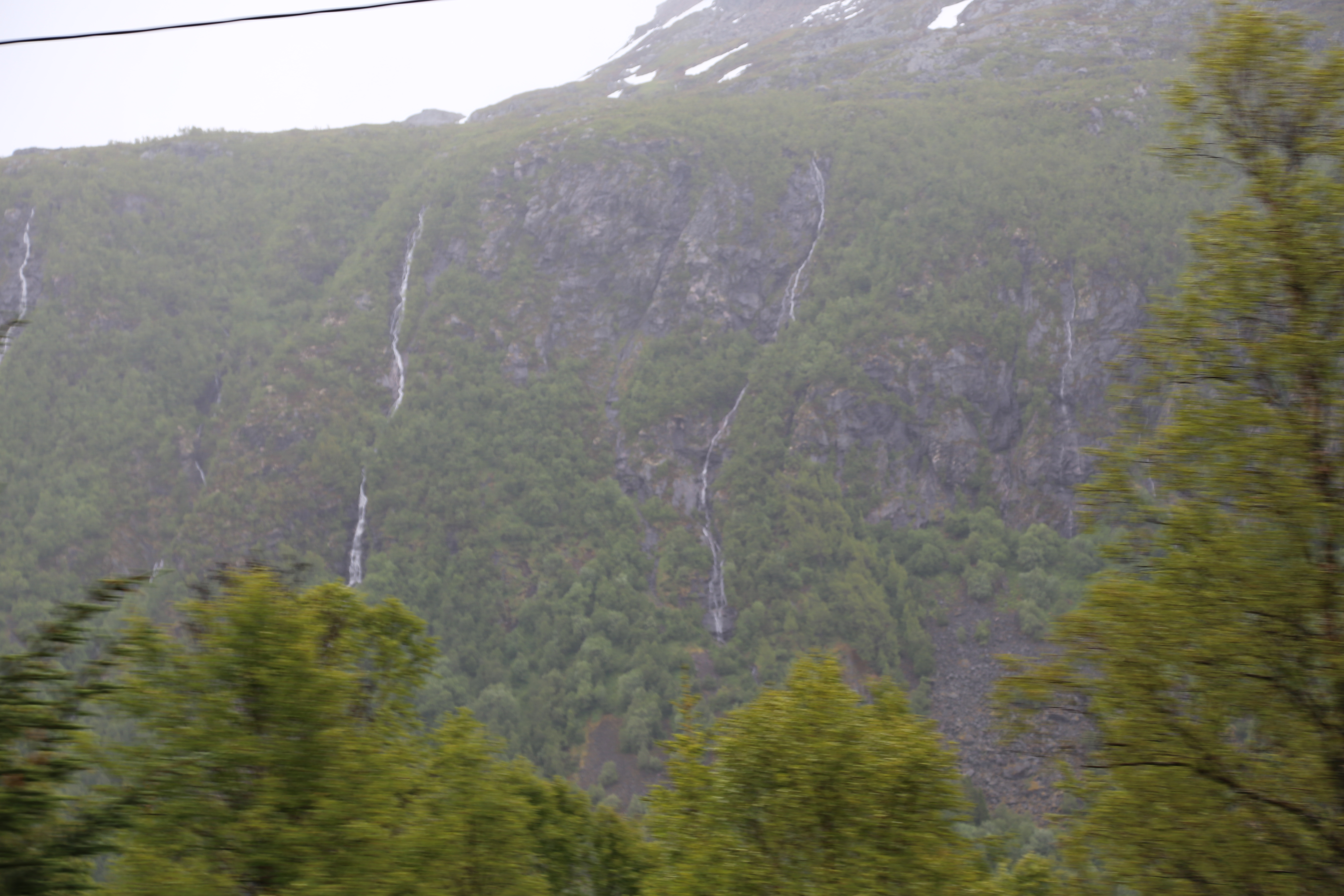 2014 Europe Trip Day 18 - Norway (Lofoten Islands: Sordal Tunnel (4 miles),  Sloverfjord Tunnel (2 miles), Chocolate Chip Rolls, Svolvaer, Lofoten Stockfish (Hanging Cod), Fishing Village Named Å, Snails, Fiskeburger (Fish Burger), Wild Reindeer) 