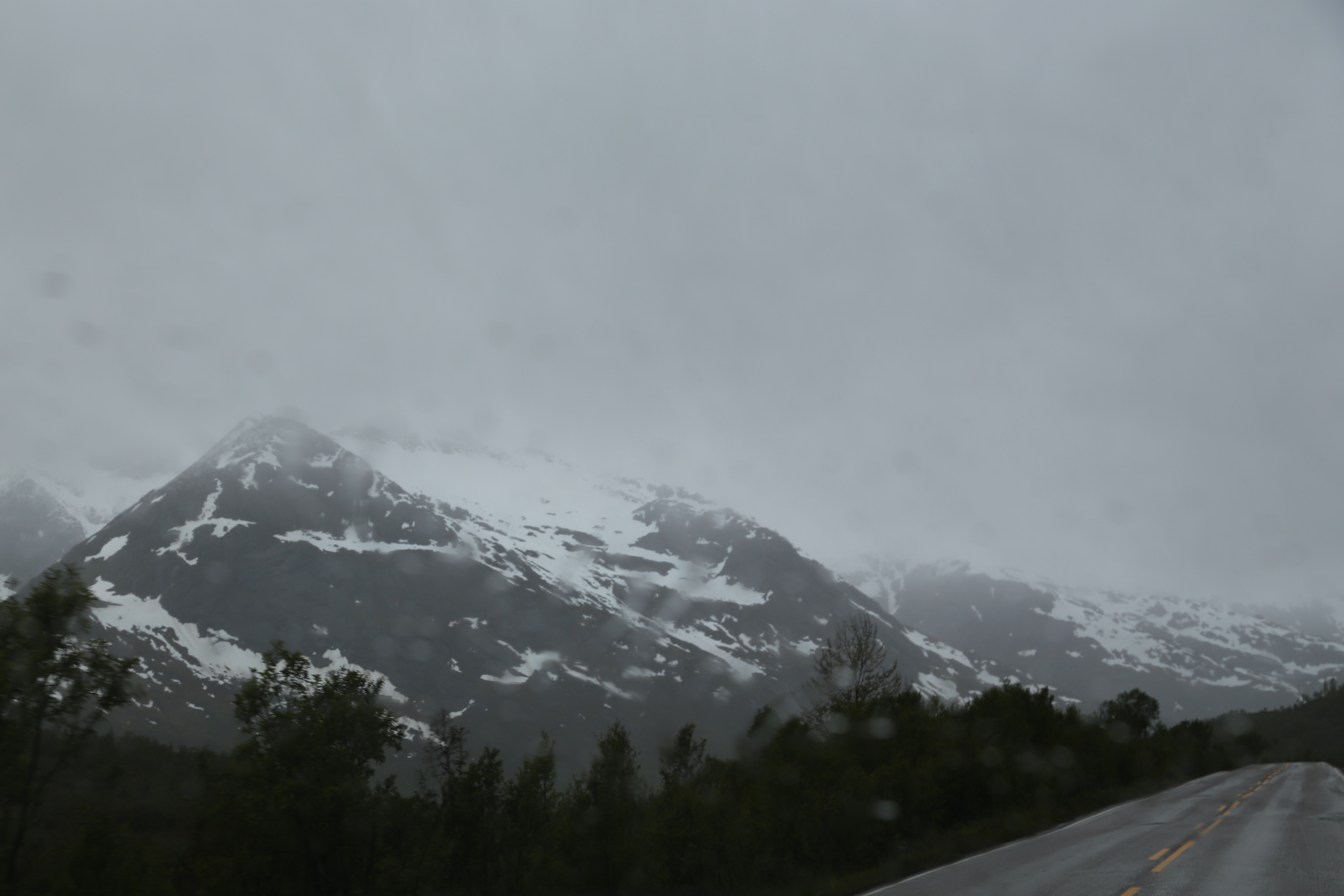 2014 Europe Trip Day 18 - Norway (Lofoten Islands: Sordal Tunnel (4 miles),  Sloverfjord Tunnel (2 miles), Chocolate Chip Rolls, Svolvaer, Lofoten Stockfish (Hanging Cod), Fishing Village Named Å, Snails, Fiskeburger (Fish Burger), Wild Reindeer) 