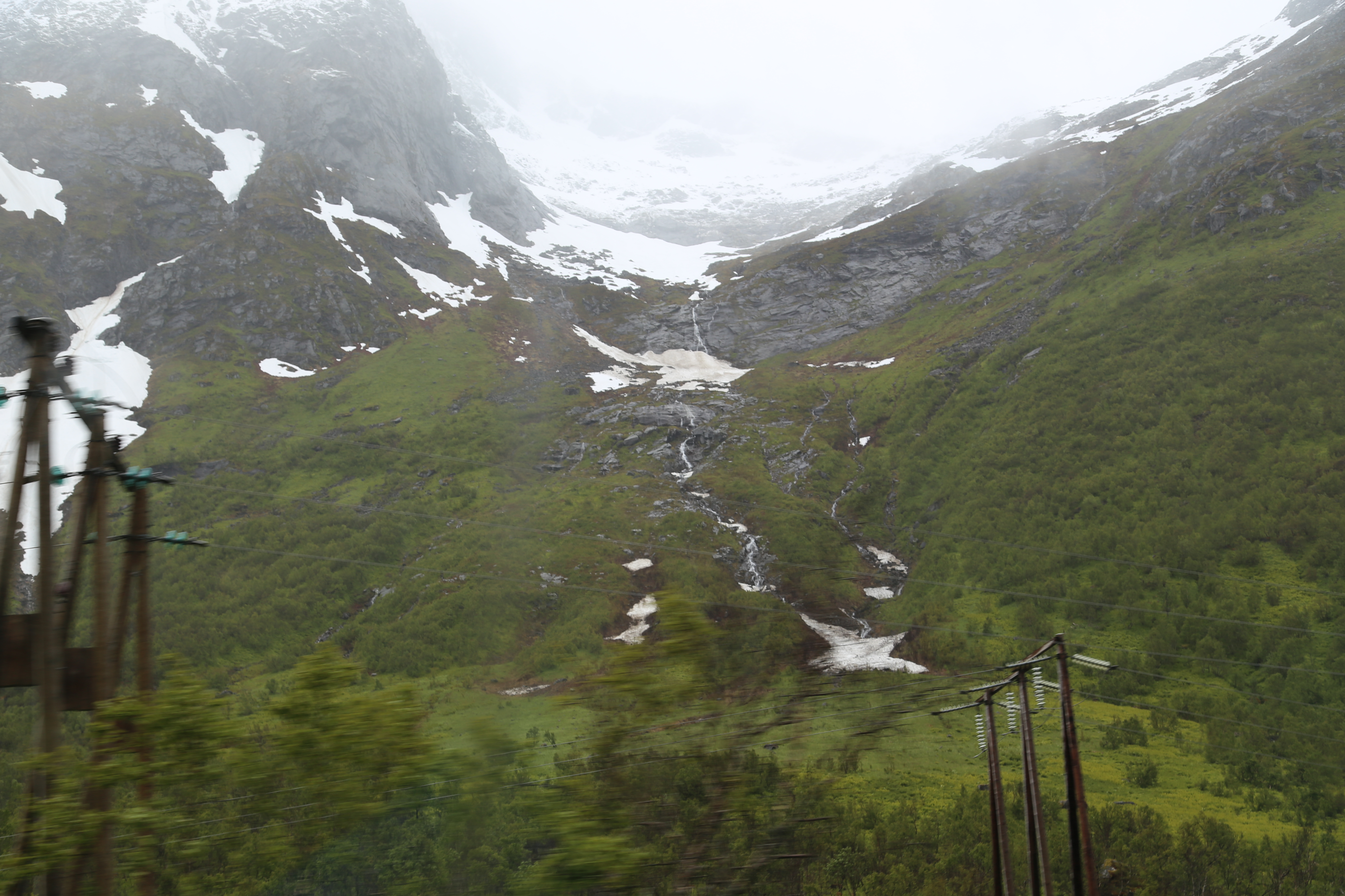 2014 Europe Trip Day 18 - Norway (Lofoten Islands: Sordal Tunnel (4 miles),  Sloverfjord Tunnel (2 miles), Chocolate Chip Rolls, Svolvaer, Lofoten Stockfish (Hanging Cod), Fishing Village Named Å, Snails, Fiskeburger (Fish Burger), Wild Reindeer) 