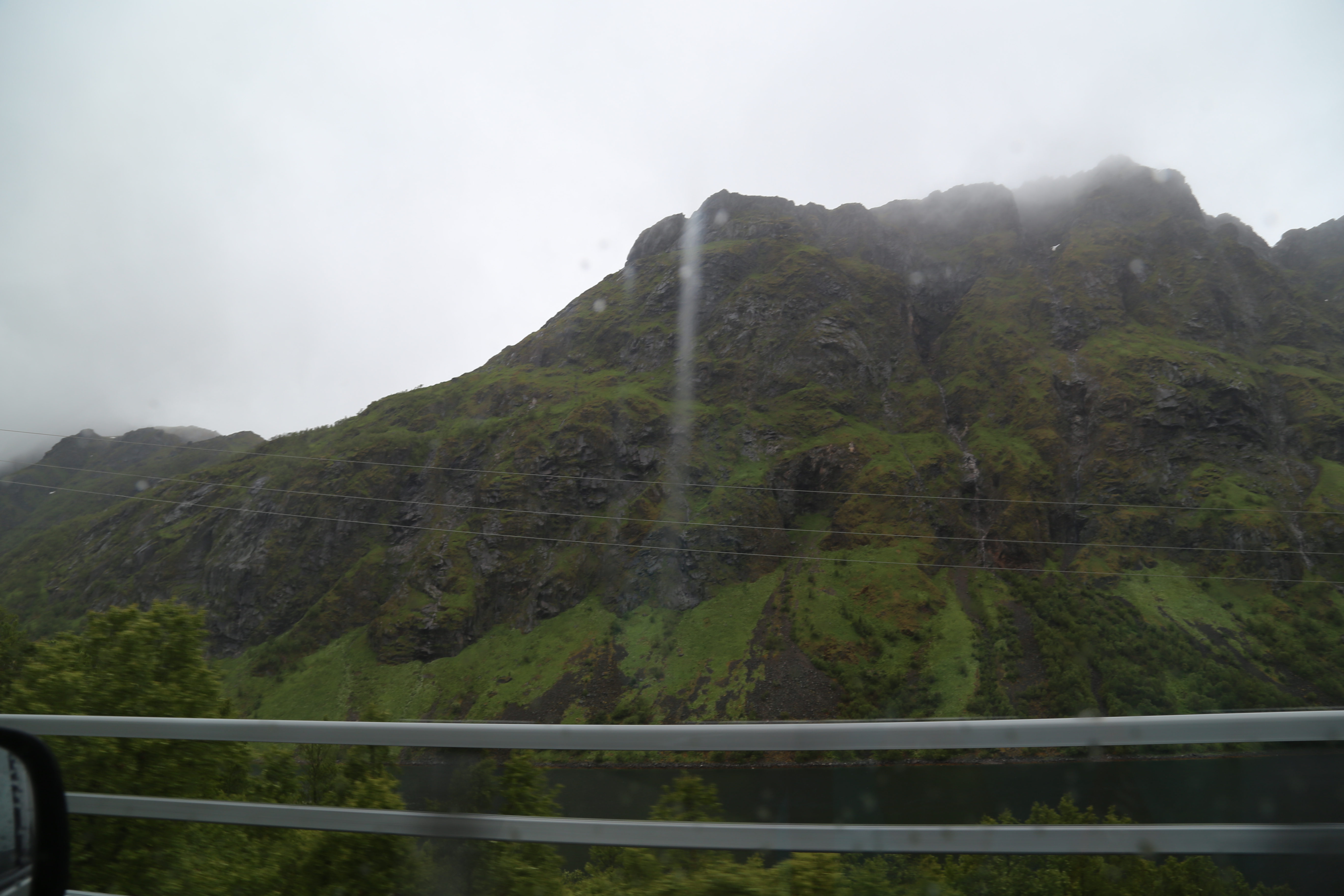 2014 Europe Trip Day 18 - Norway (Lofoten Islands: Sordal Tunnel (4 miles),  Sloverfjord Tunnel (2 miles), Chocolate Chip Rolls, Svolvaer, Lofoten Stockfish (Hanging Cod), Fishing Village Named Å, Snails, Fiskeburger (Fish Burger), Wild Reindeer) 