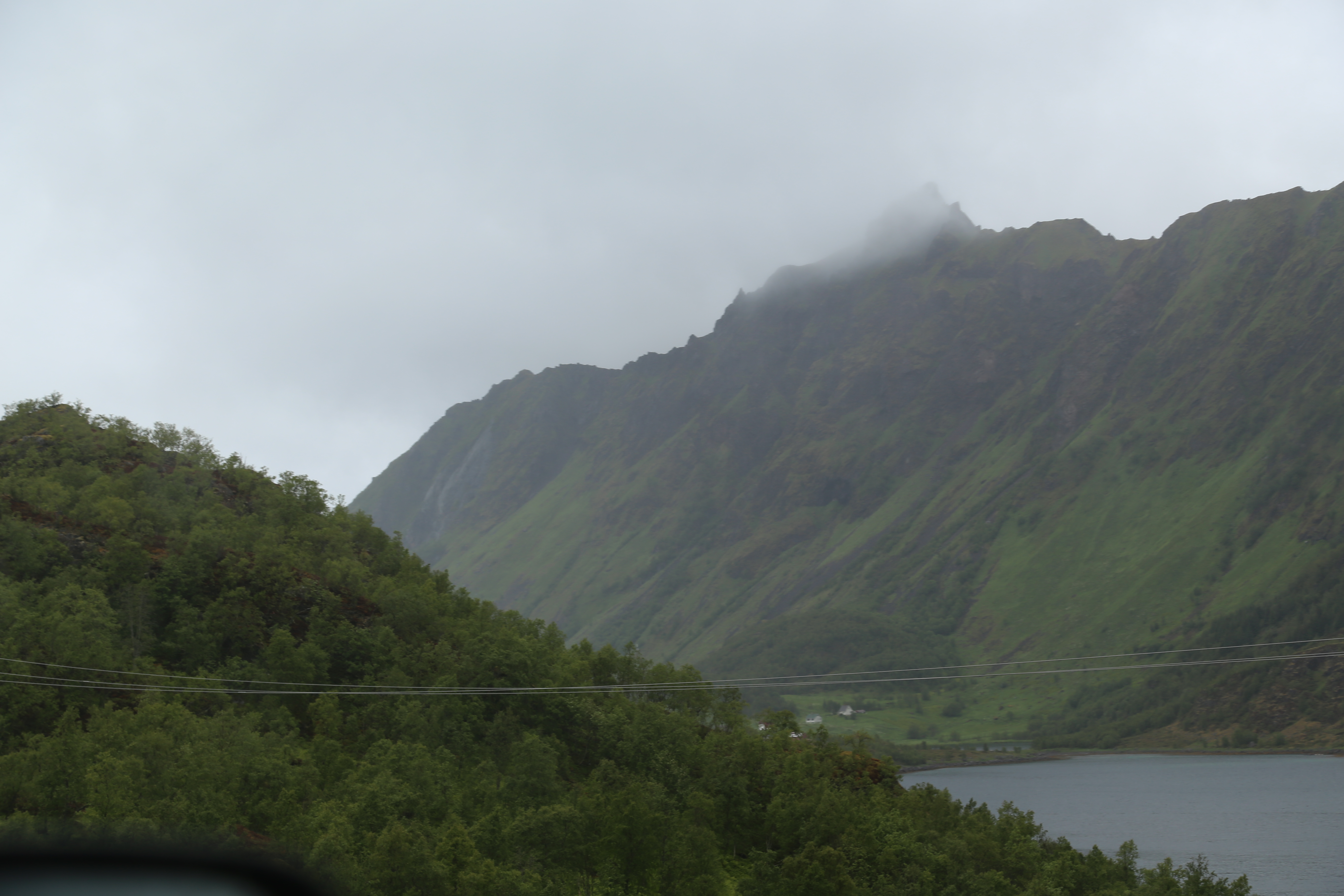 2014 Europe Trip Day 18 - Norway (Lofoten Islands: Sordal Tunnel (4 miles),  Sloverfjord Tunnel (2 miles), Chocolate Chip Rolls, Svolvaer, Lofoten Stockfish (Hanging Cod), Fishing Village Named Å, Snails, Fiskeburger (Fish Burger), Wild Reindeer) 