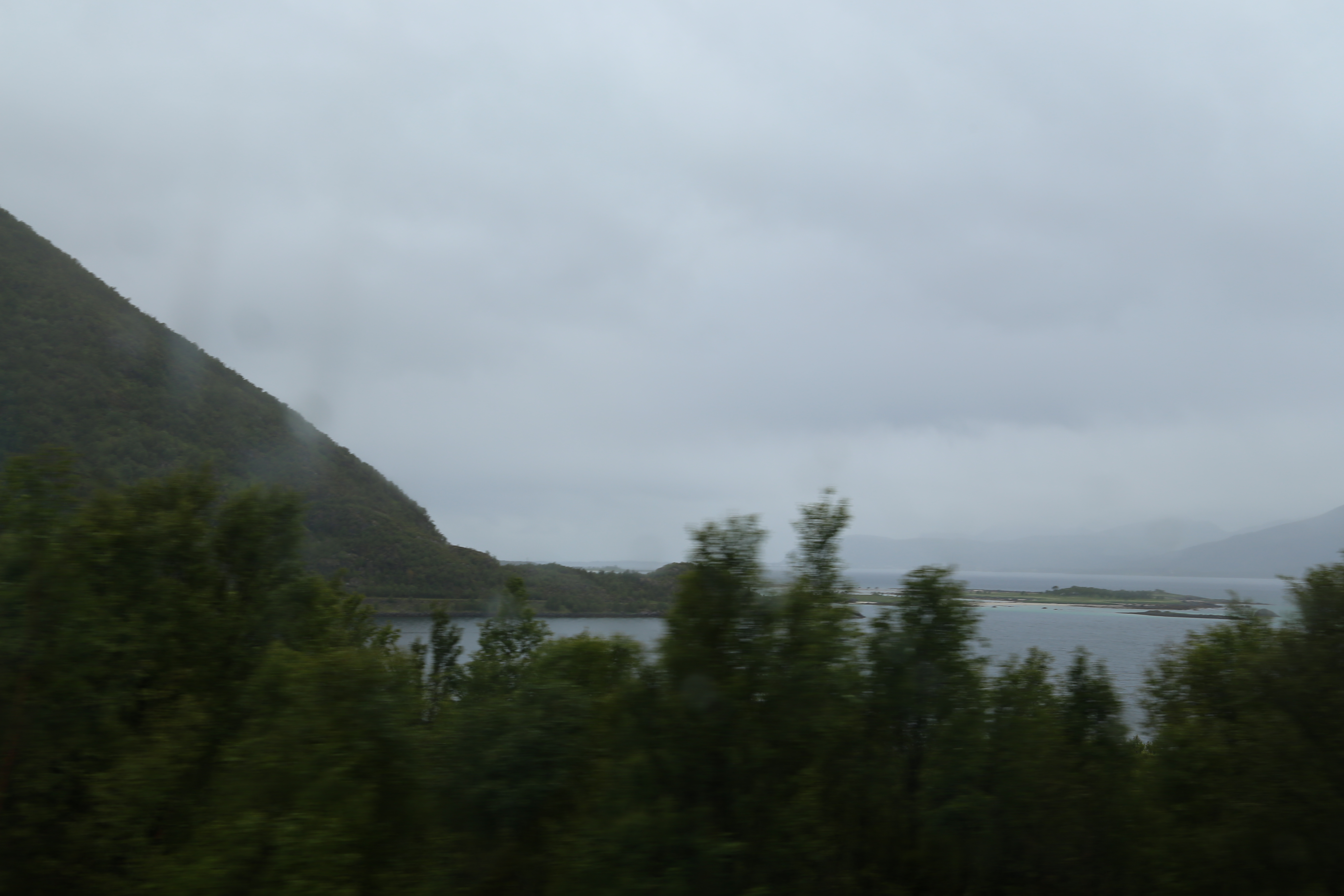 2014 Europe Trip Day 18 - Norway (Lofoten Islands: Sordal Tunnel (4 miles),  Sloverfjord Tunnel (2 miles), Chocolate Chip Rolls, Svolvaer, Lofoten Stockfish (Hanging Cod), Fishing Village Named Å, Snails, Fiskeburger (Fish Burger), Wild Reindeer) 