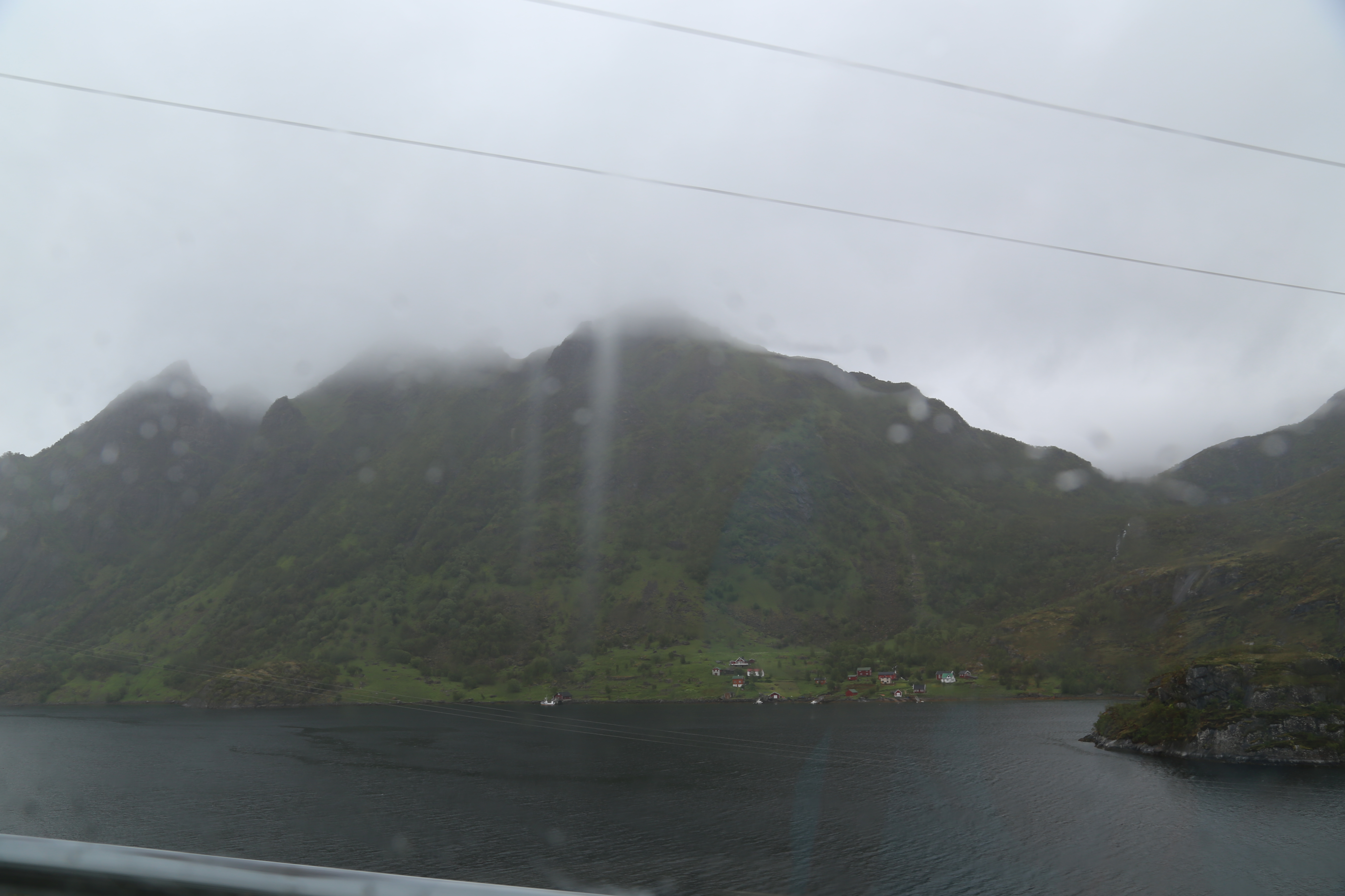 2014 Europe Trip Day 18 - Norway (Lofoten Islands: Sordal Tunnel (4 miles),  Sloverfjord Tunnel (2 miles), Chocolate Chip Rolls, Svolvaer, Lofoten Stockfish (Hanging Cod), Fishing Village Named Å, Snails, Fiskeburger (Fish Burger), Wild Reindeer) 