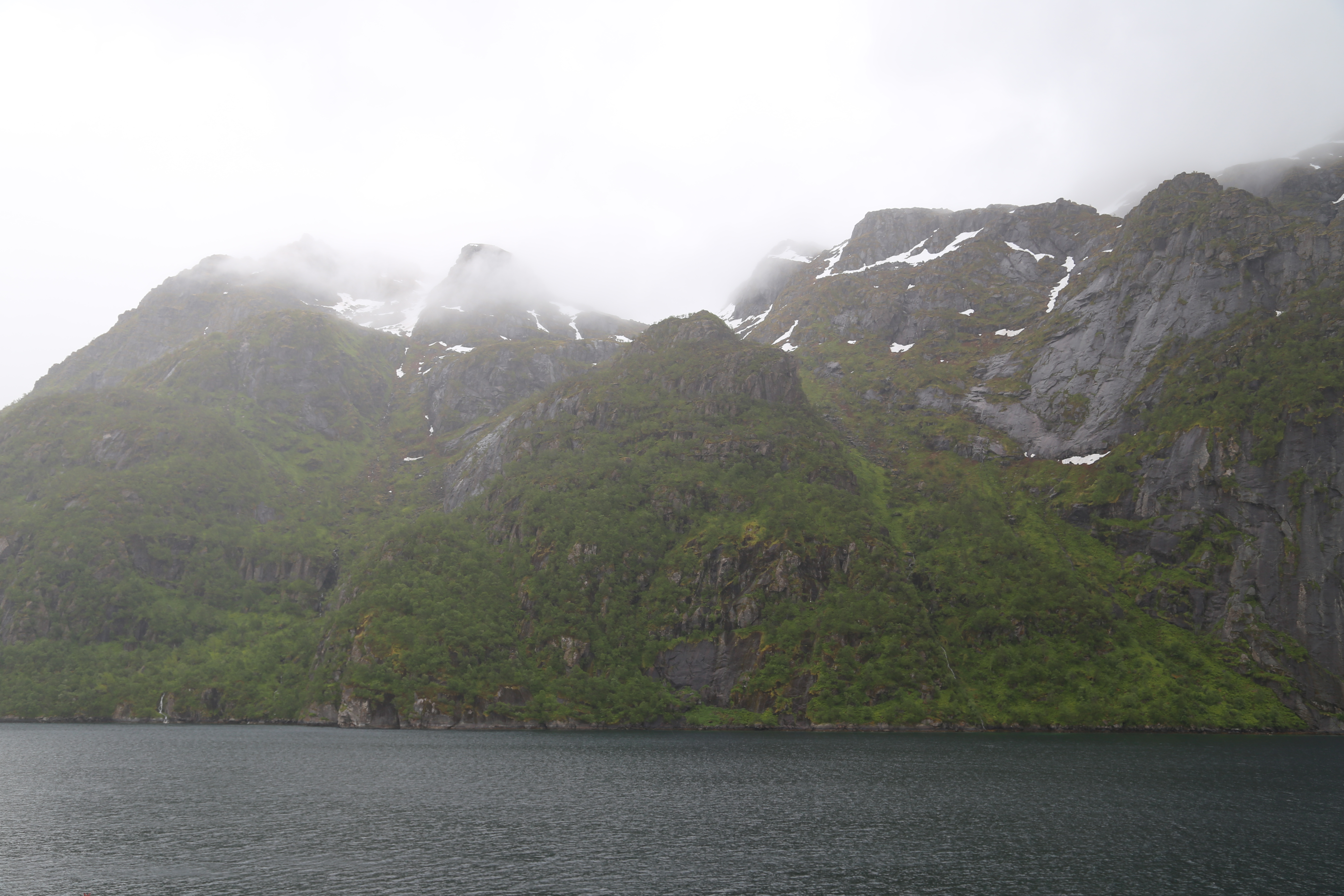 2014 Europe Trip Day 18 - Norway (Lofoten Islands: Sordal Tunnel (4 miles),  Sloverfjord Tunnel (2 miles), Chocolate Chip Rolls, Svolvaer, Lofoten Stockfish (Hanging Cod), Fishing Village Named Å, Snails, Fiskeburger (Fish Burger), Wild Reindeer) 