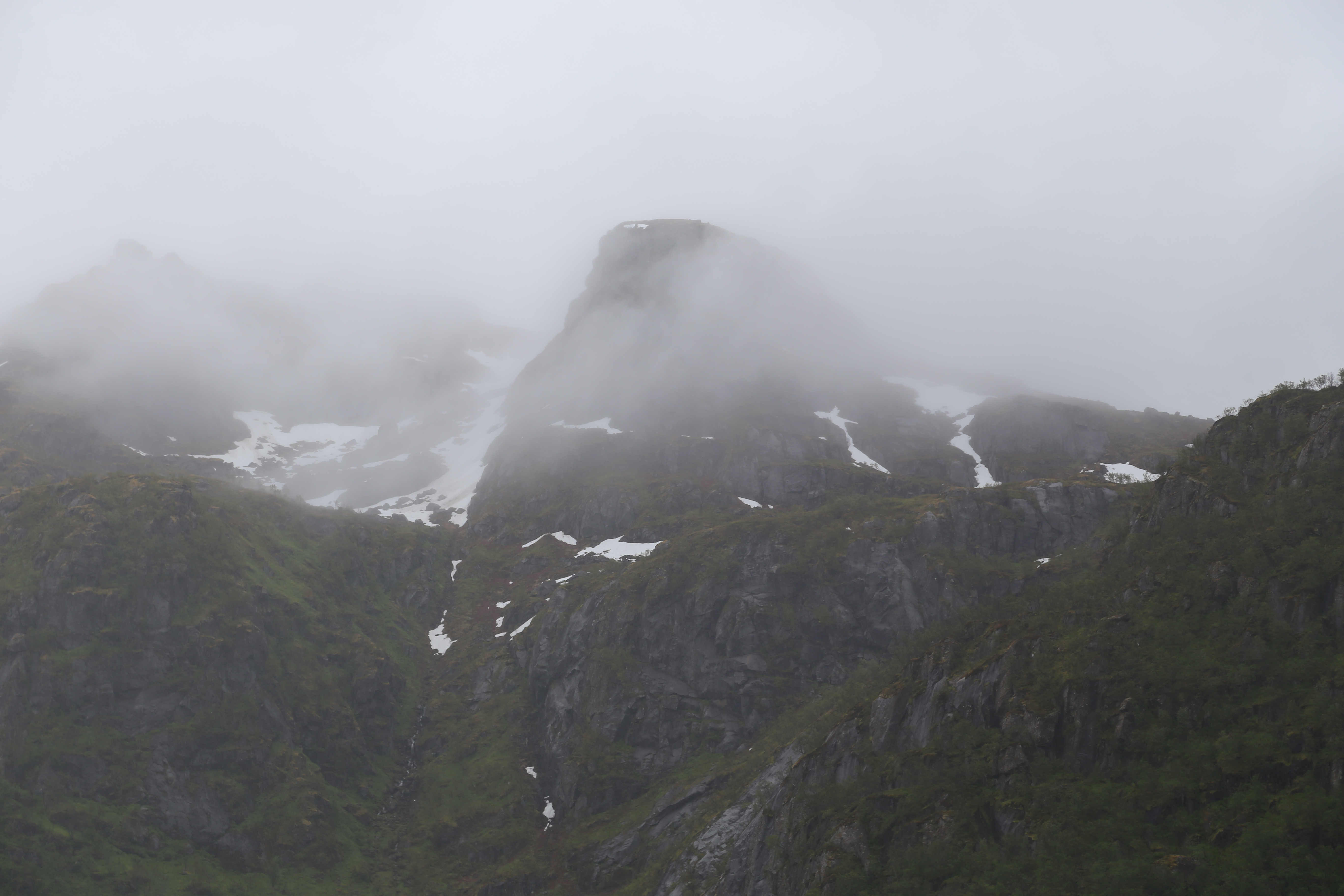 2014 Europe Trip Day 18 - Norway (Lofoten Islands: Sordal Tunnel (4 miles),  Sloverfjord Tunnel (2 miles), Chocolate Chip Rolls, Svolvaer, Lofoten Stockfish (Hanging Cod), Fishing Village Named Å, Snails, Fiskeburger (Fish Burger), Wild Reindeer) 