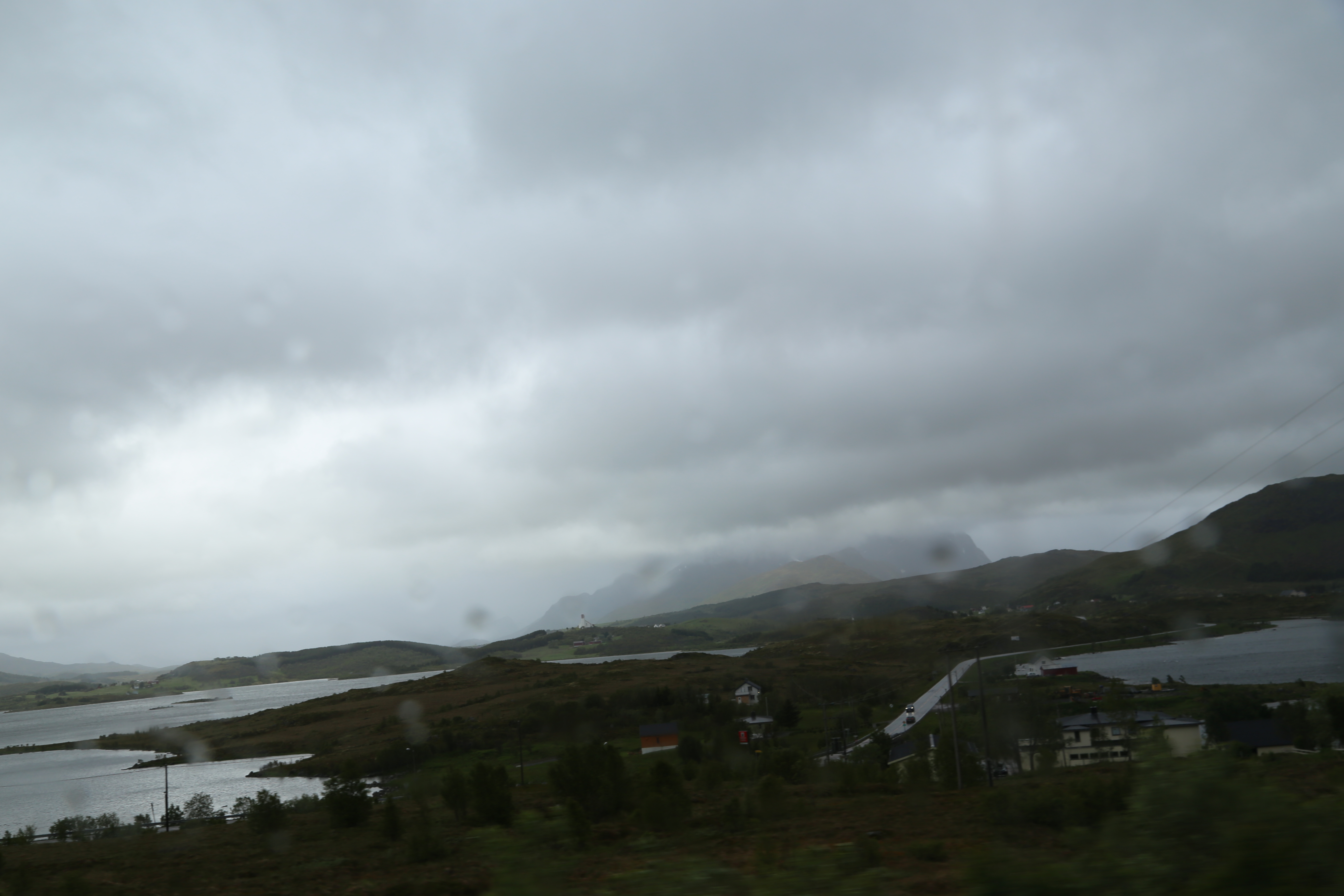 2014 Europe Trip Day 18 - Norway (Lofoten Islands: Sordal Tunnel (4 miles),  Sloverfjord Tunnel (2 miles), Chocolate Chip Rolls, Svolvaer, Lofoten Stockfish (Hanging Cod), Fishing Village Named Å, Snails, Fiskeburger (Fish Burger), Wild Reindeer) 