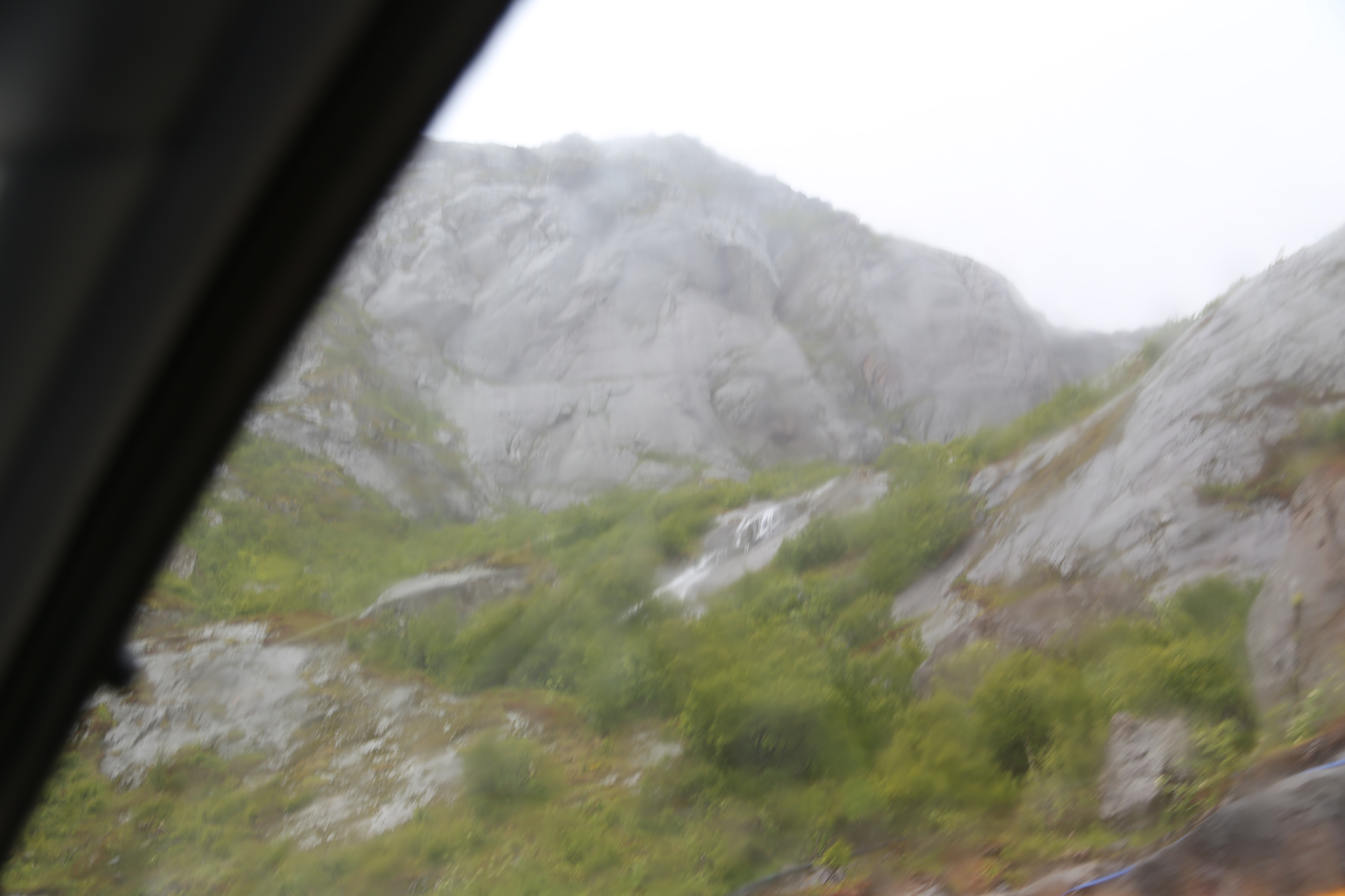 2014 Europe Trip Day 18 - Norway (Lofoten Islands: Sordal Tunnel (4 miles),  Sloverfjord Tunnel (2 miles), Chocolate Chip Rolls, Svolvaer, Lofoten Stockfish (Hanging Cod), Fishing Village Named Å, Snails, Fiskeburger (Fish Burger), Wild Reindeer) 