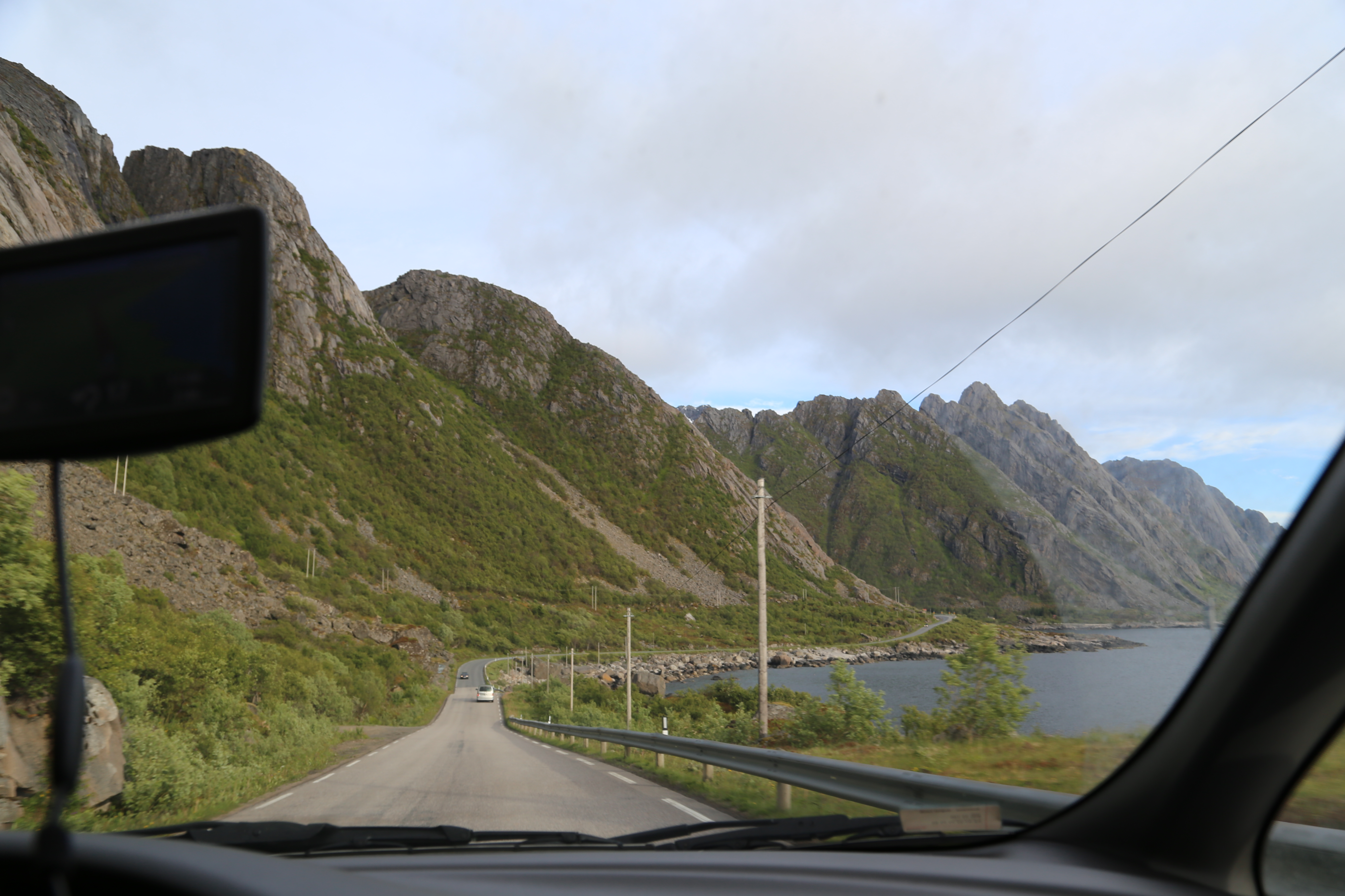 2014 Europe Trip Day 18 - Norway (Lofoten Islands: Sordal Tunnel (4 miles),  Sloverfjord Tunnel (2 miles), Chocolate Chip Rolls, Svolvaer, Lofoten Stockfish (Hanging Cod), Fishing Village Named Å, Snails, Fiskeburger (Fish Burger), Wild Reindeer) 