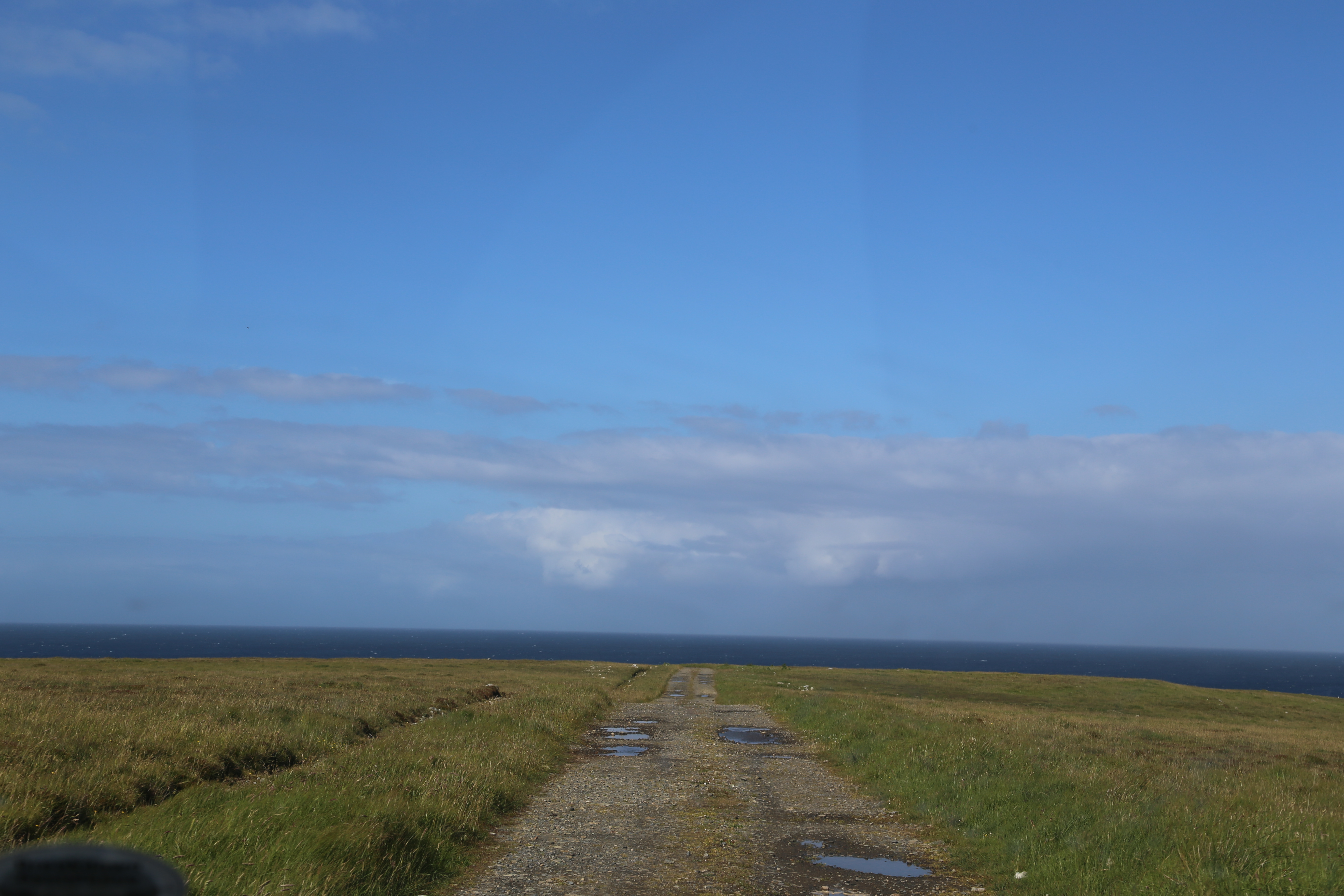 2014 Europe Trip Day 29 - Scotland (Callanish Standing Stones, Dun Carloway Broch, Gearrannan Blackhouse Village, Harris Tweed Weaving Loom, Dailbeag Beach, Arnol Black House, Breanish Tweed, Peat, Steinacleit, Bridge to Nowhere, Traigh Mhor, Rainbow)