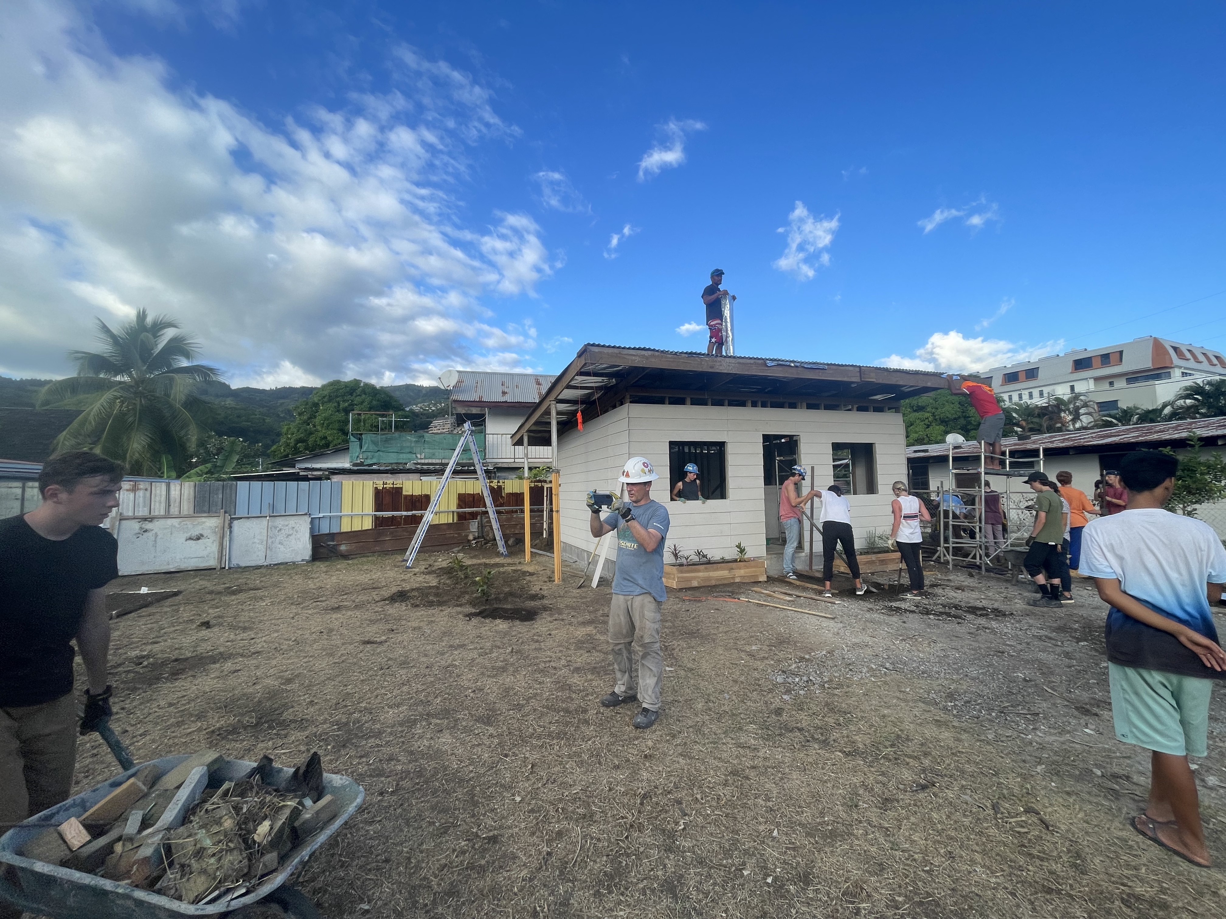 2022 Tahiti Taravao HXP - Day 13 (Work Site Day 6, National TV Station Shows Up to Film, Adding the Roof, Turtle Dies, Testimony Meeting with the Papara Ward & ❤ Bishop Taylor ❤, Shell Necklace Gifts, Tytan Teaching Spikeball (Spiceball!))